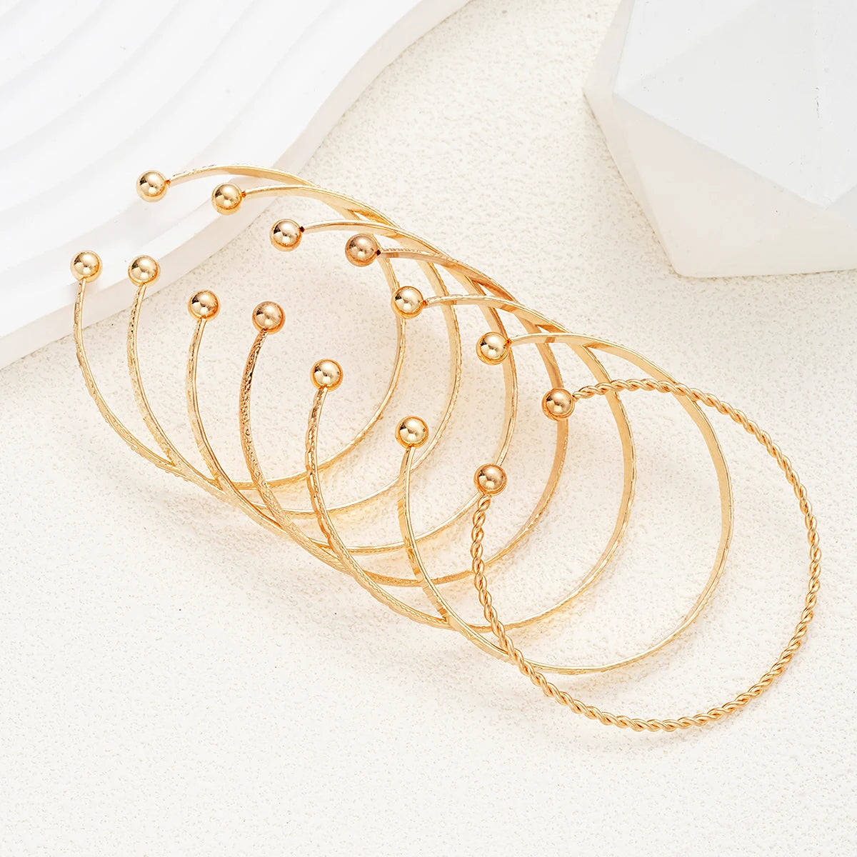 Rebel Heart" 7-Piece Gold Bracelet Stack