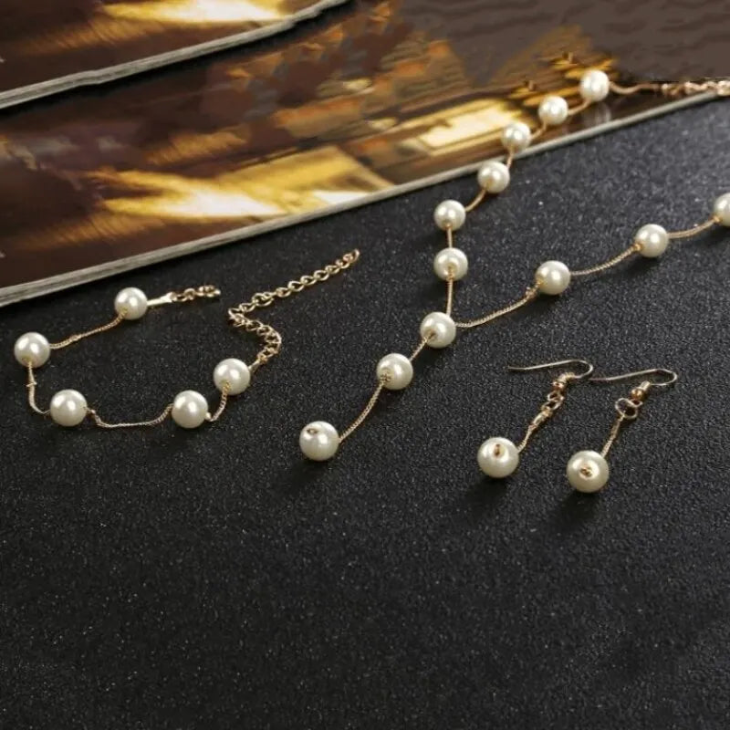 Elegant Pearl & Tassel Jewelry Set - 4-Piece Gold-Plated Statement Collection