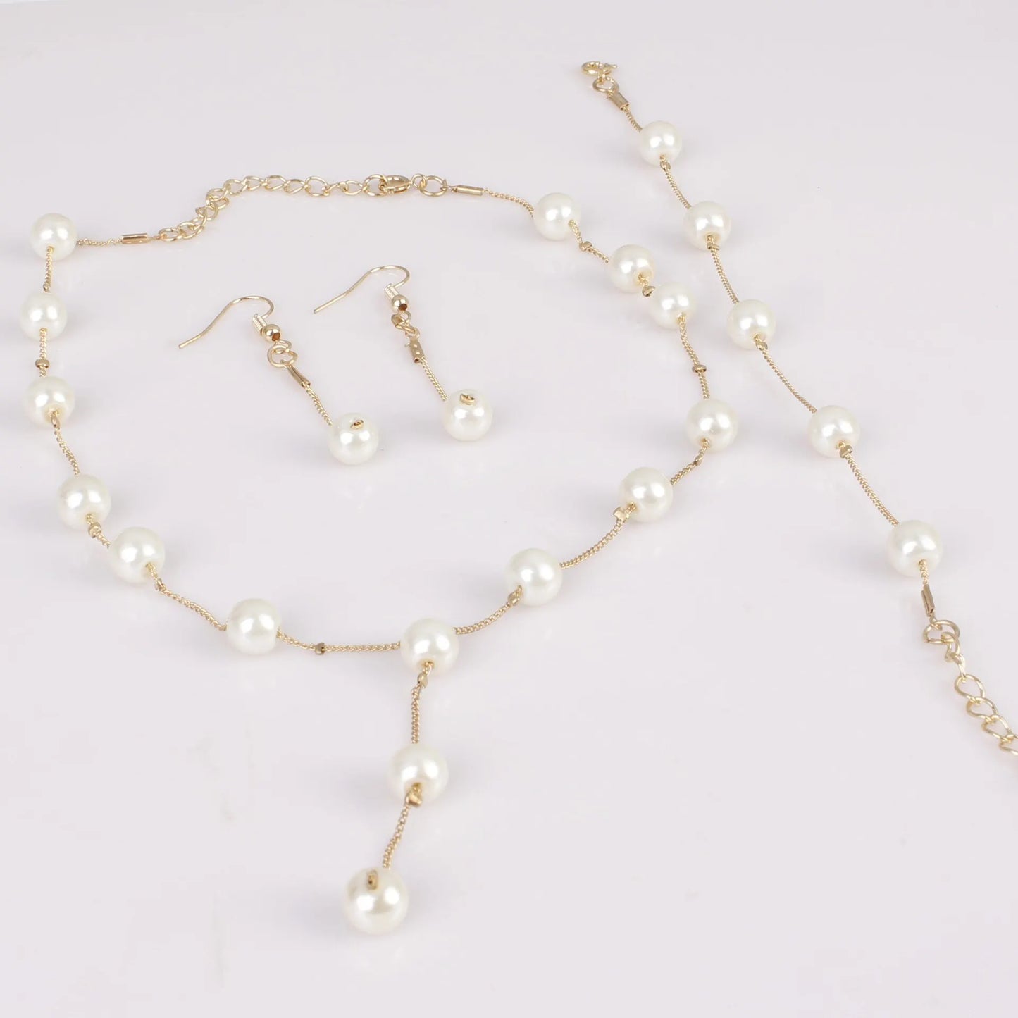Elegant Pearl & Tassel Jewelry Set - 4-Piece Gold-Plated Statement Collection