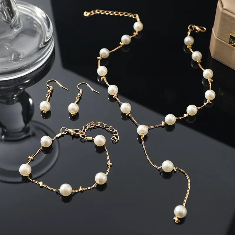 Elegant Pearl & Tassel Jewelry Set - 4-Piece Gold-Plated Statement Collection
