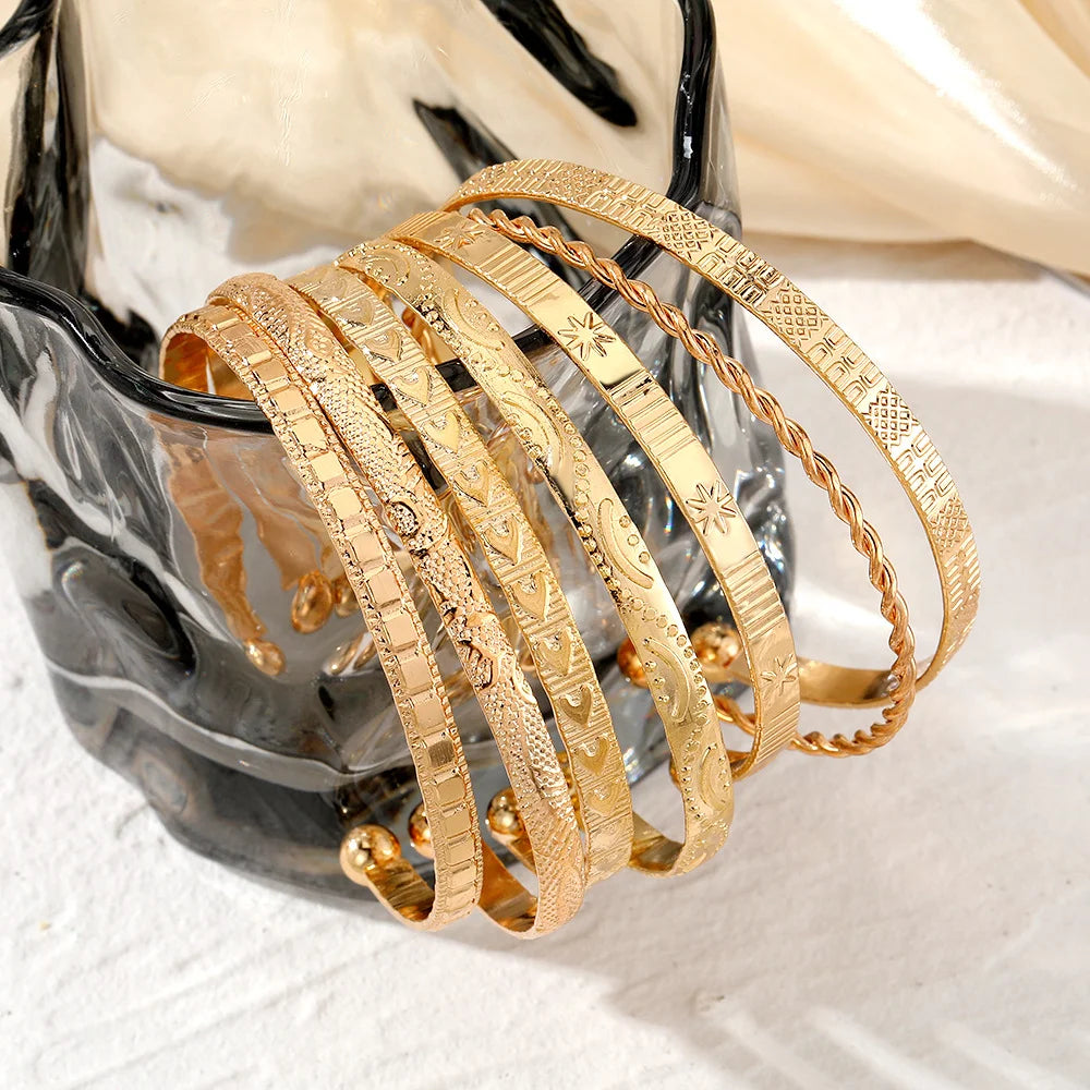 Rebel Heart" 7-Piece Gold Bracelet Stack