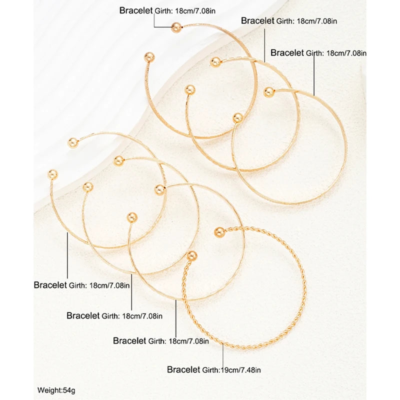 Rebel Heart" 7-Piece Gold Bracelet Stack