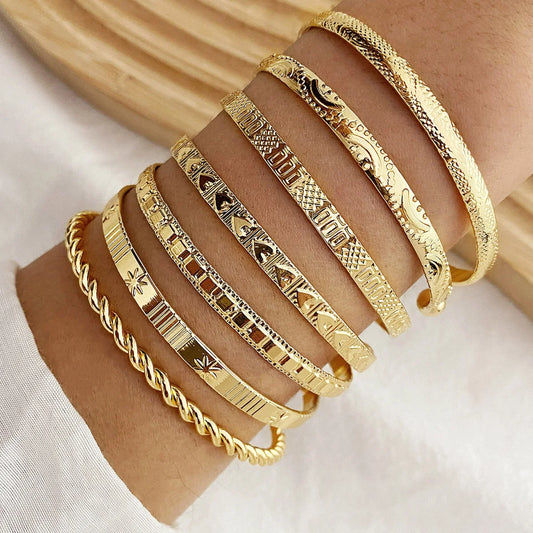 Rebel Heart" 7-Piece Gold Bracelet Stack