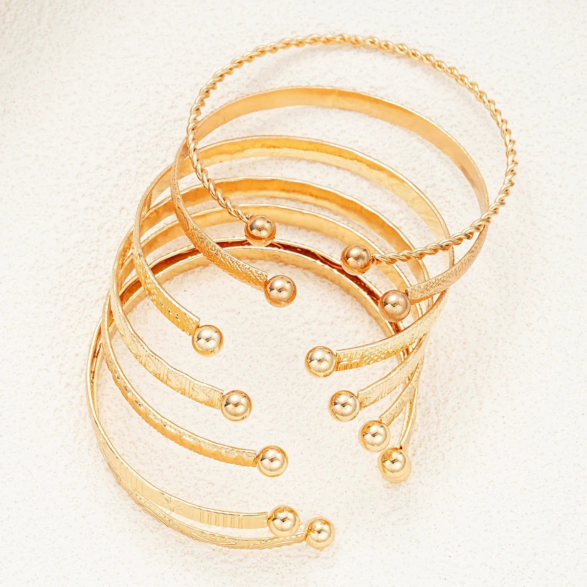 Rebel Heart" 7-Piece Gold Bracelet Stack